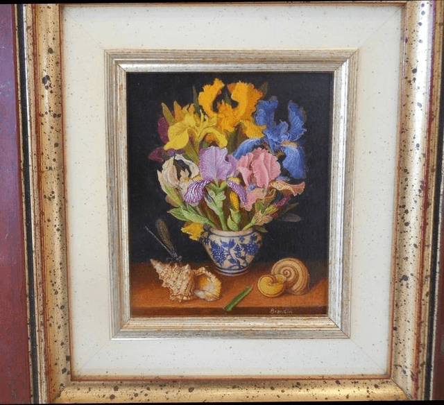 Still life with iris flowers bouquet, shells and dragonfly