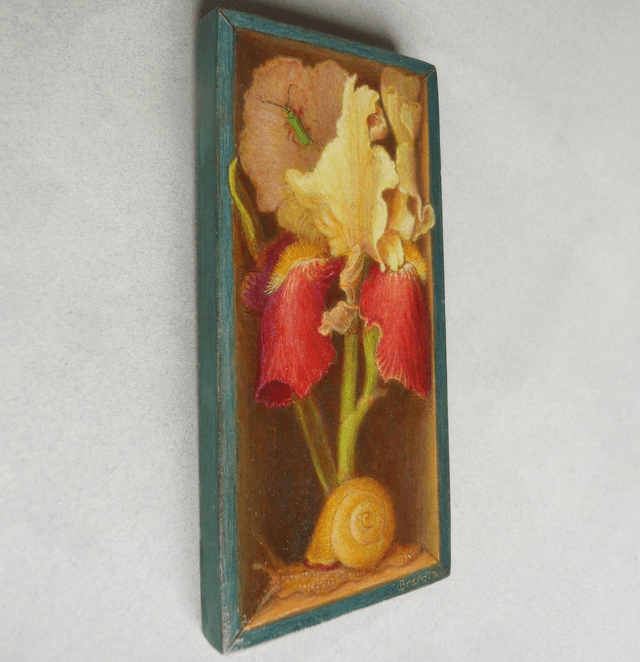 Trompe l'oeil painting of an iris and a snail in a blue box