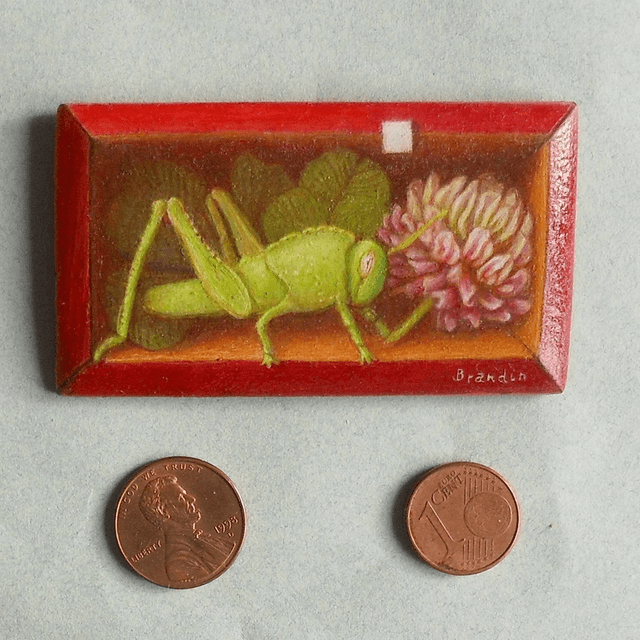 Trompe l&#039;oeil painting with a green grasshopper and a clover flower 